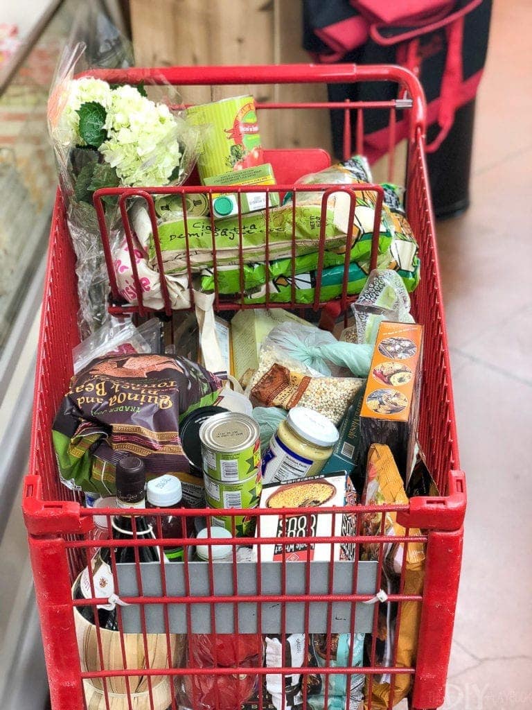 full cart of groceries at trader joe's