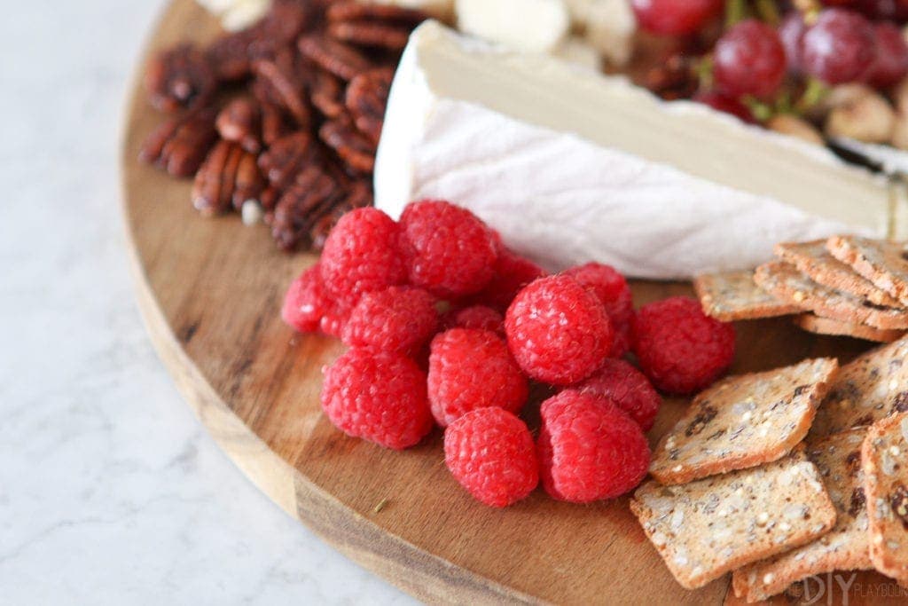 use berries on your cheese board for color and sweetness