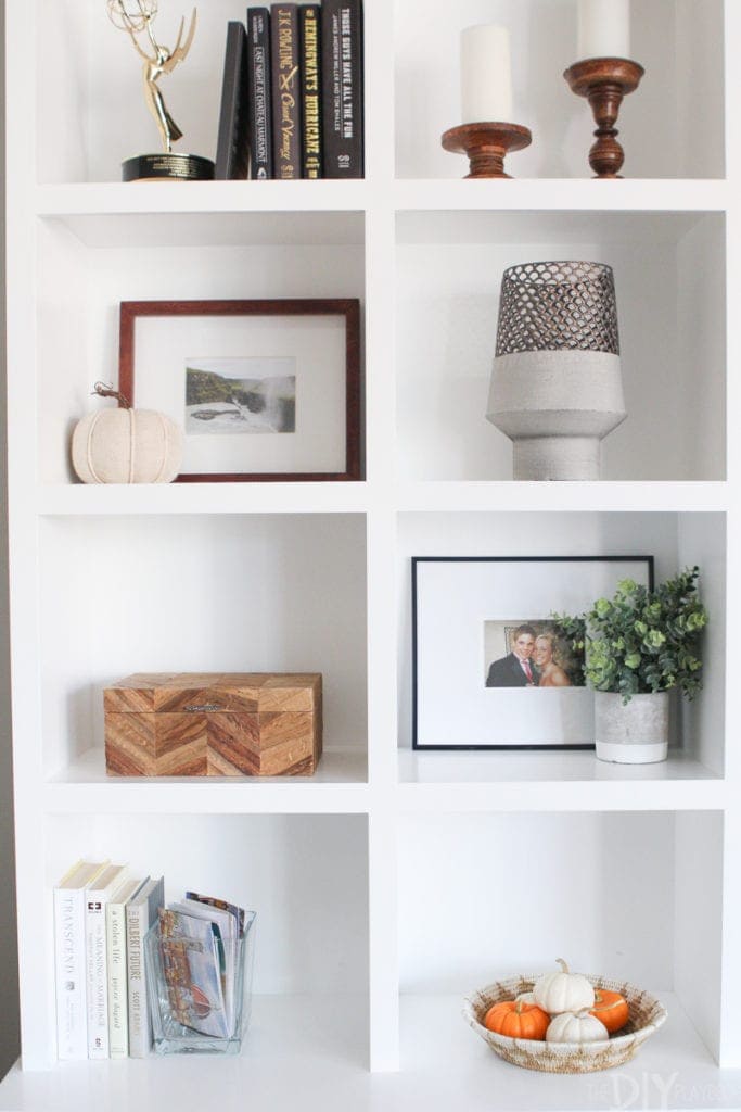 White built-in shelves with accessories