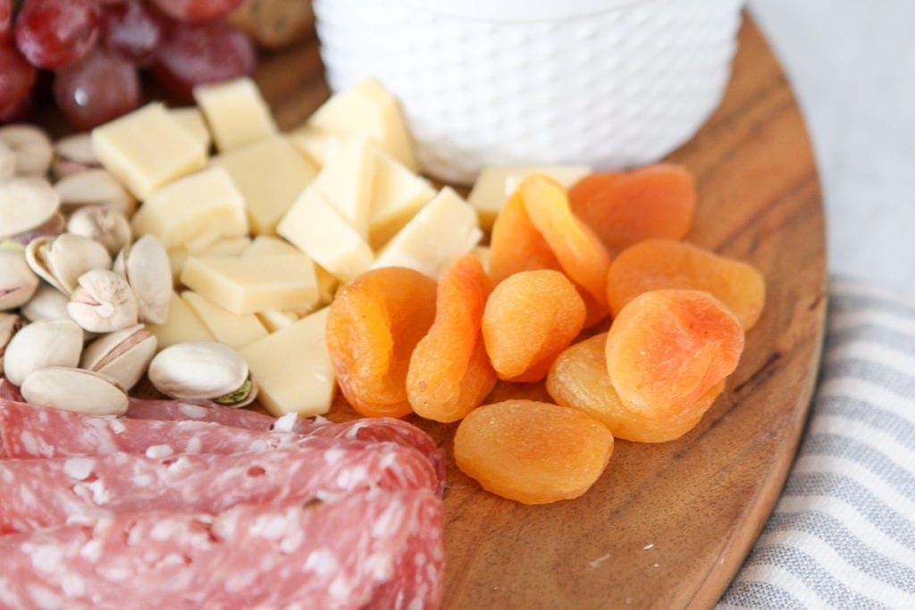Dried fruit, like dried apricots, are perfect for a charcuterie board