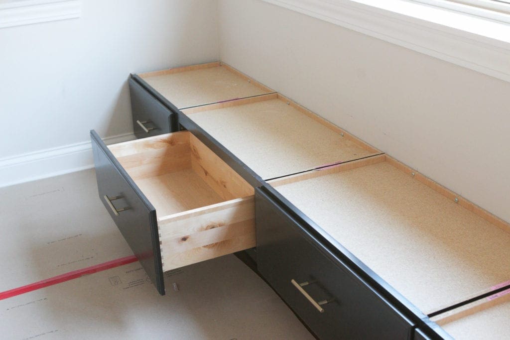 black drawers that double as a window seat