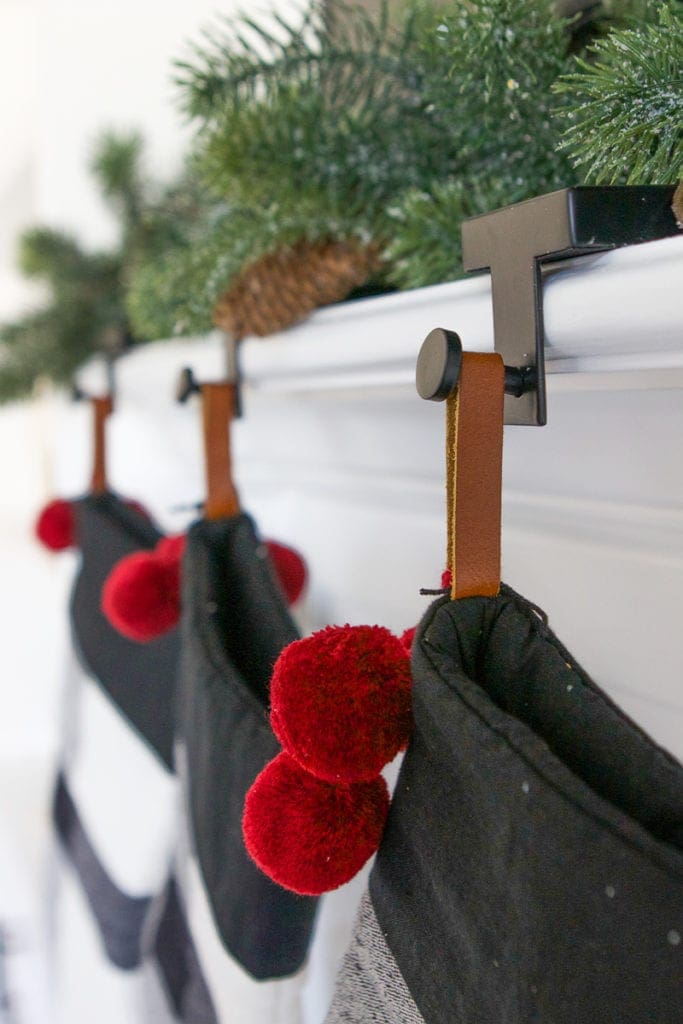 hanging stockings on a mantel
