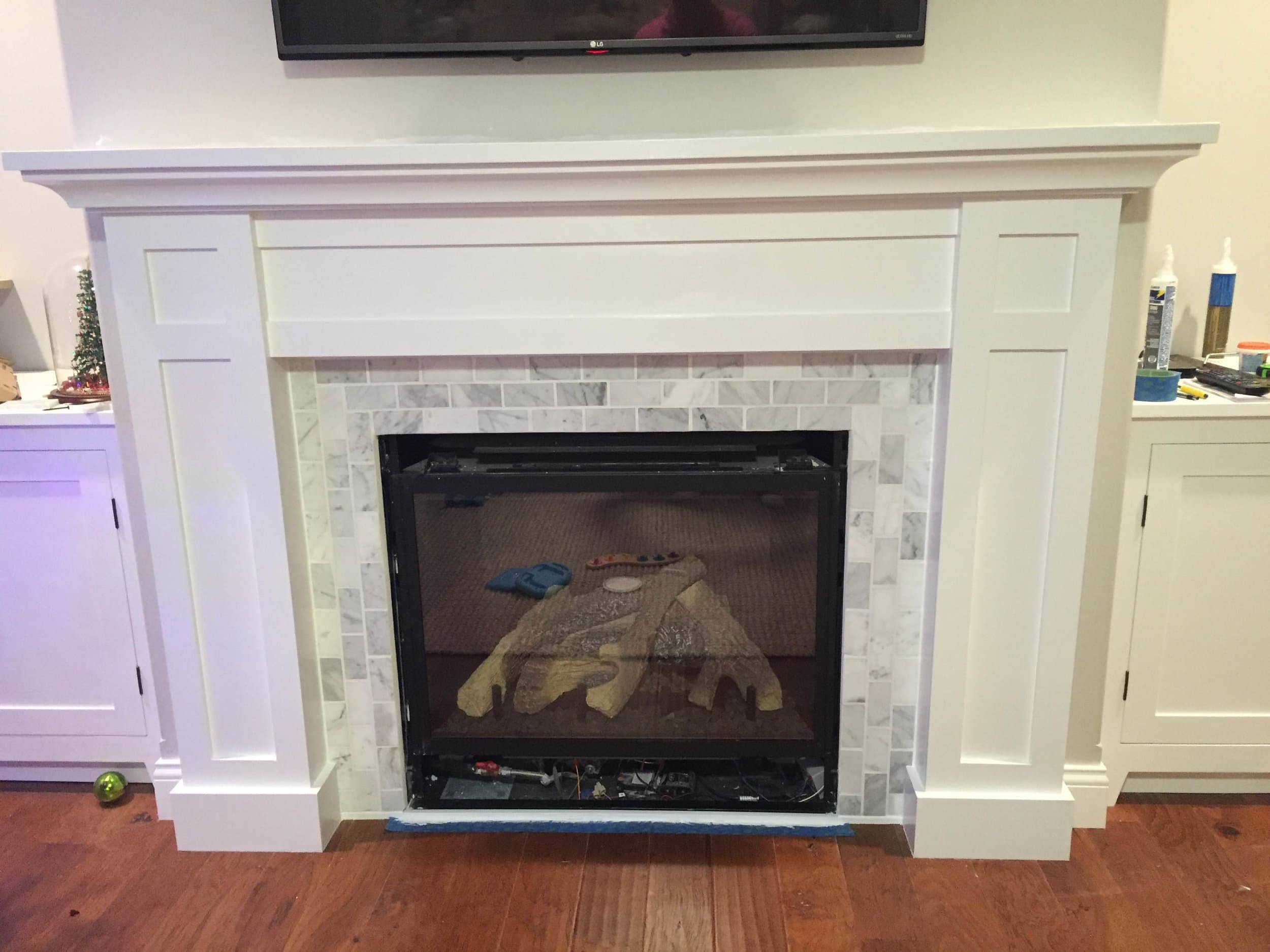 Marble and craftsman style fireplace
