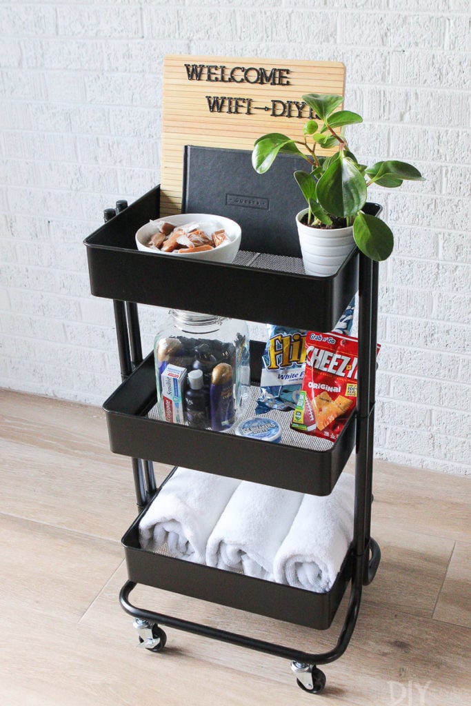 Use a rolling cart to hold guest room essentials