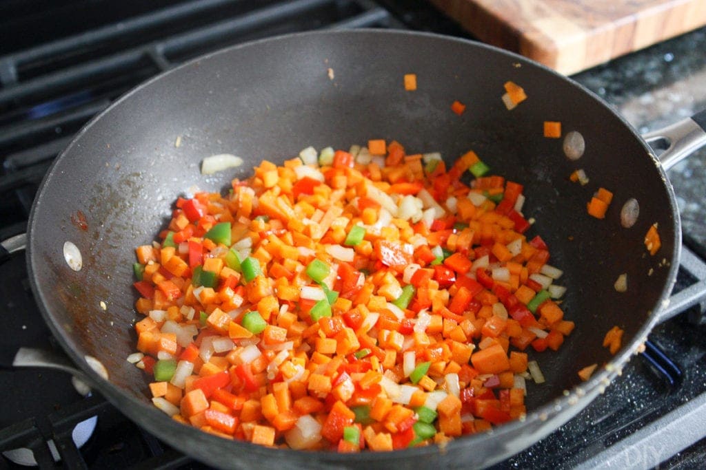 Cooking chopped veggies in a skillet
