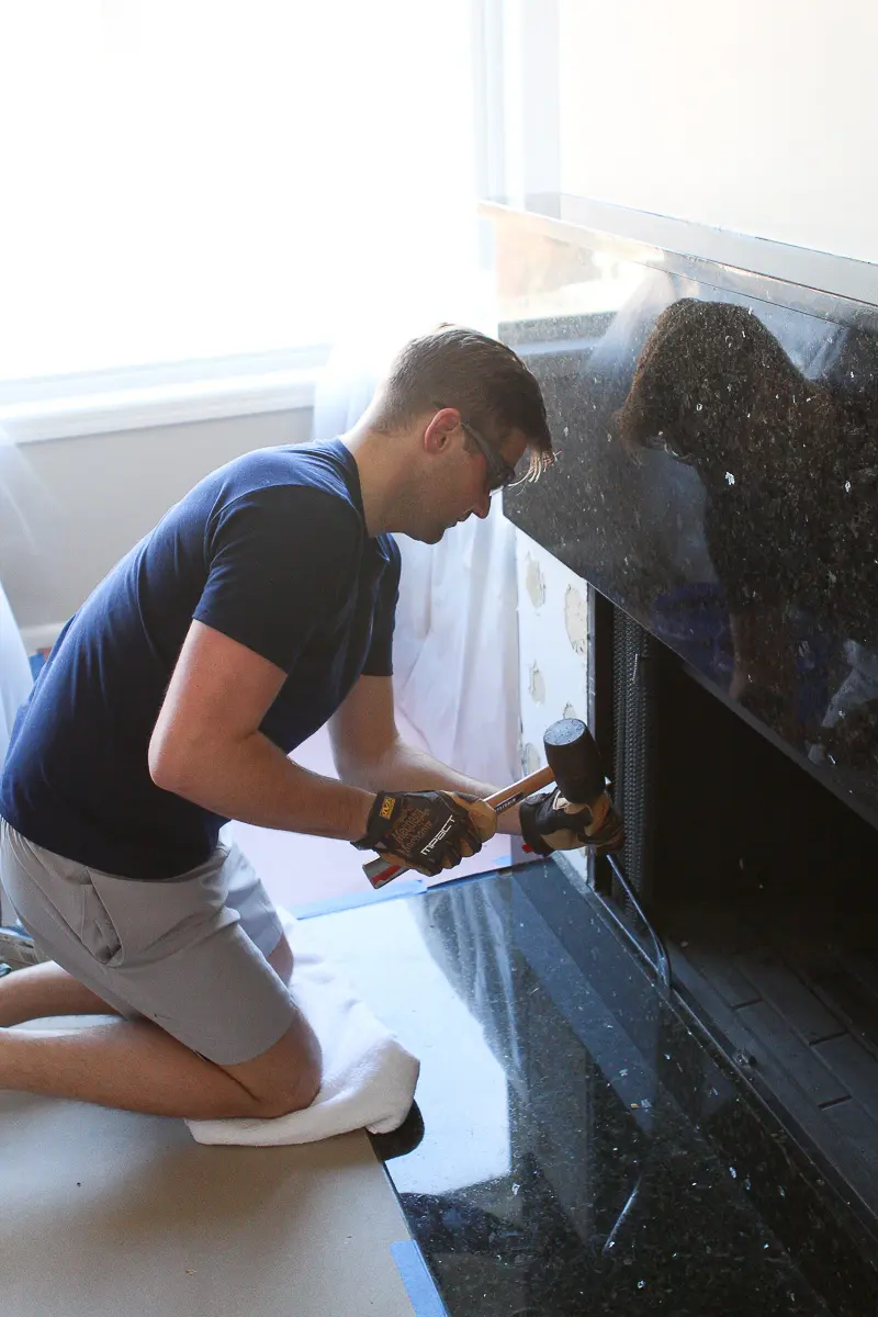 Finn renovating a fireplace