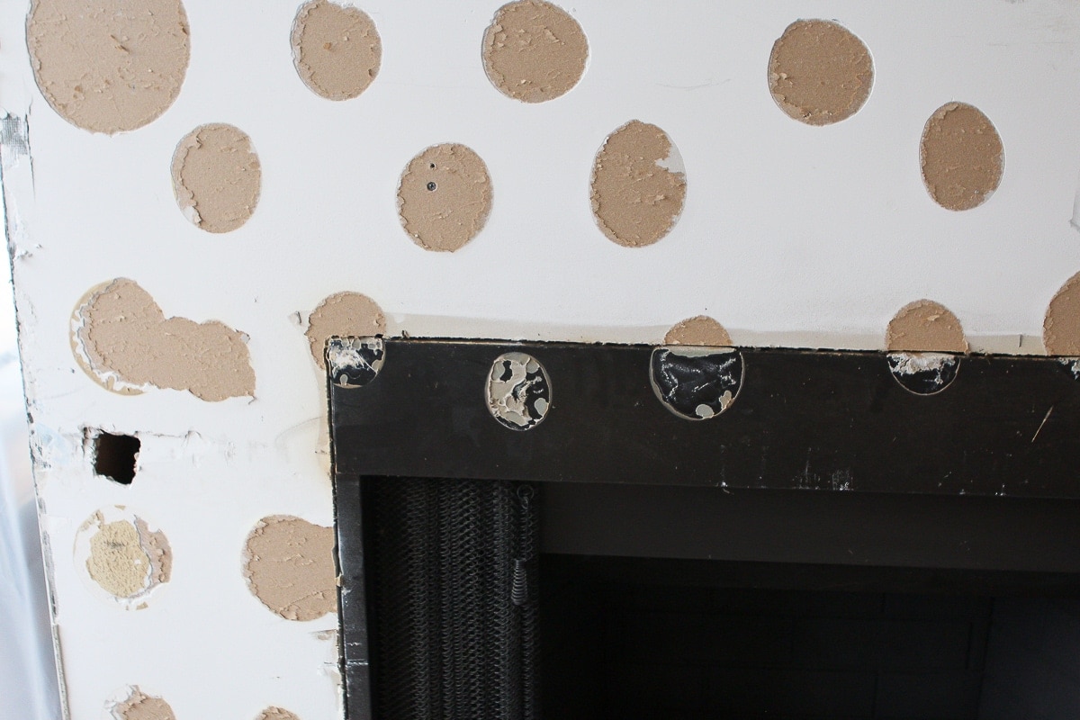 Glue spots on a fireplace surround