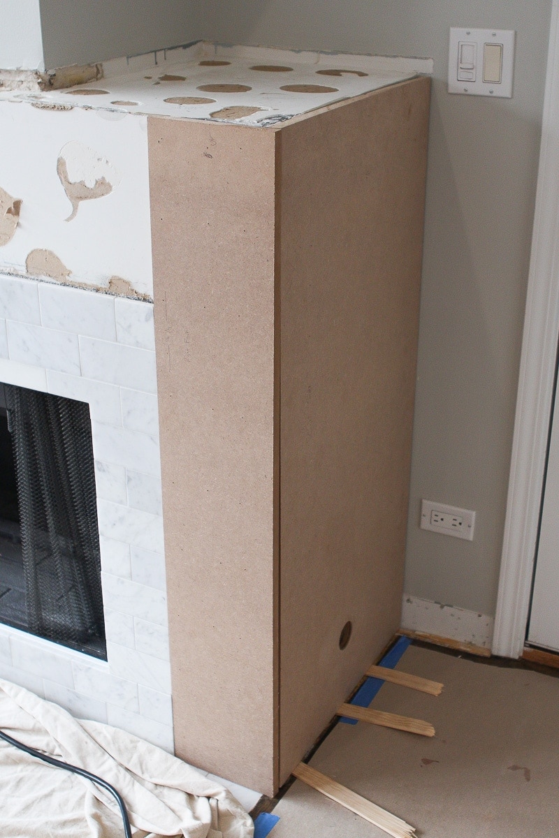 2 pieces of mdf on the fireplace