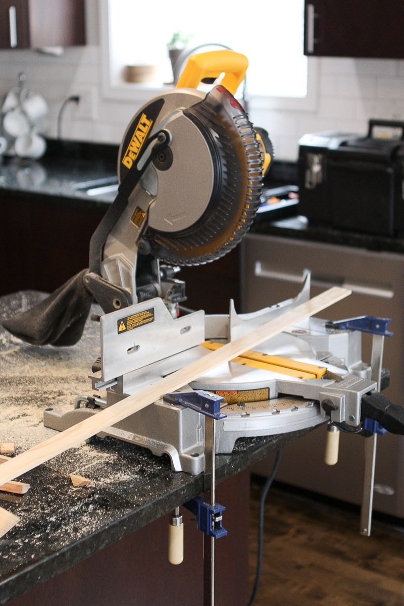 Using a miter saw to cut pieces of lattice