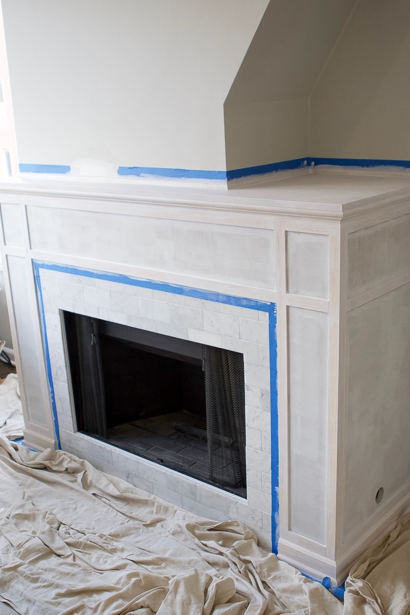 1 coat of primer on a DIY marble fireplace