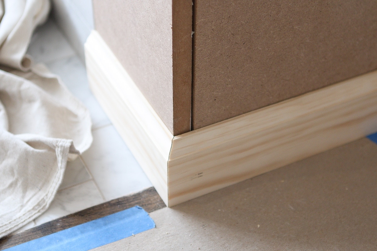 Adding baseboard and shoe to a fireplace