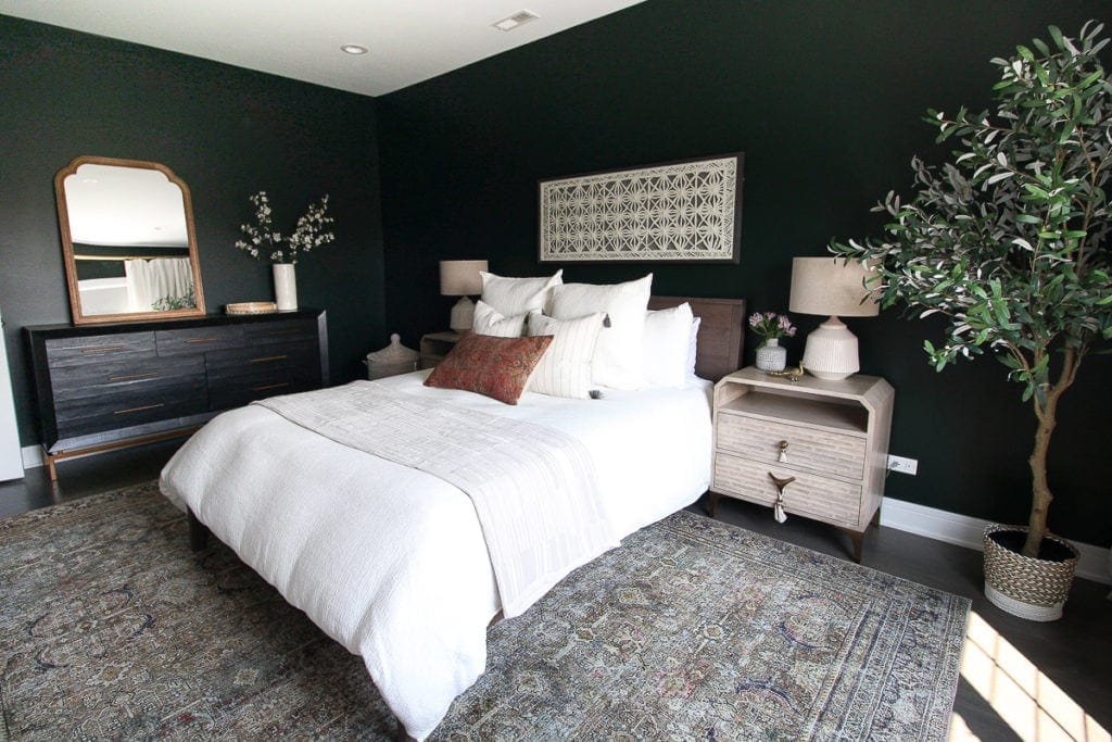 Green bedroom with white accents