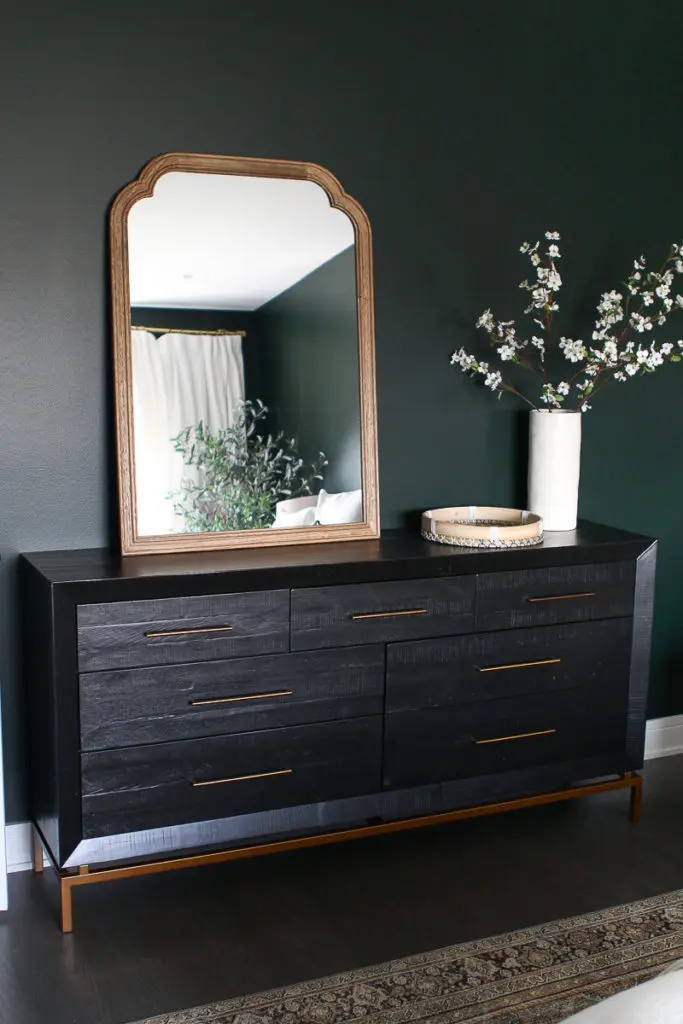 Black dresser with wood mirror