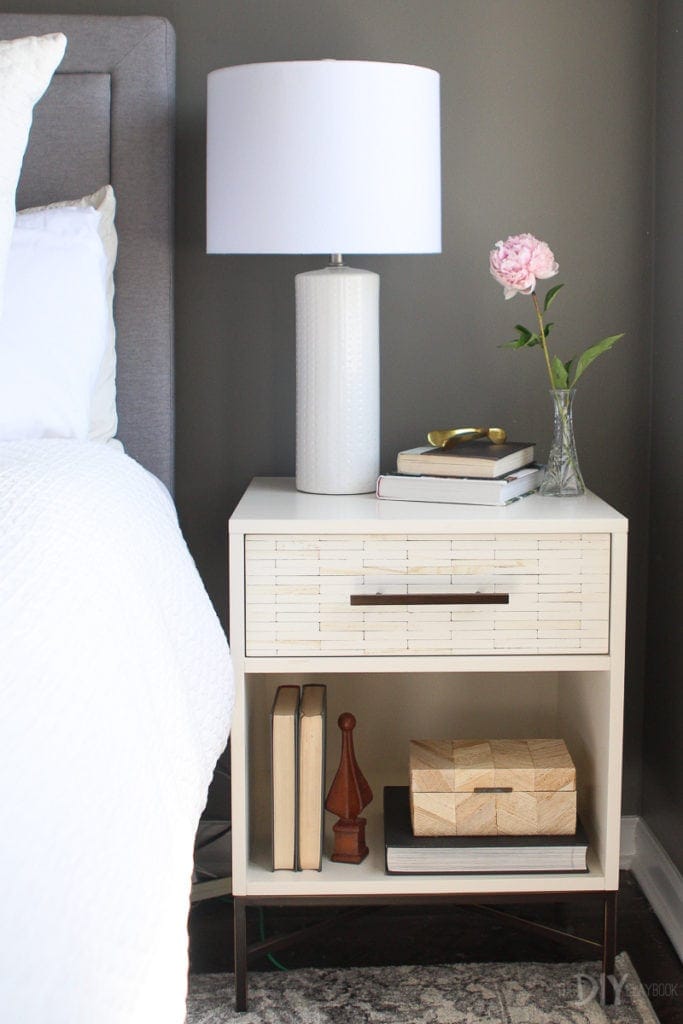 West Elm nightstand with neutral accessories