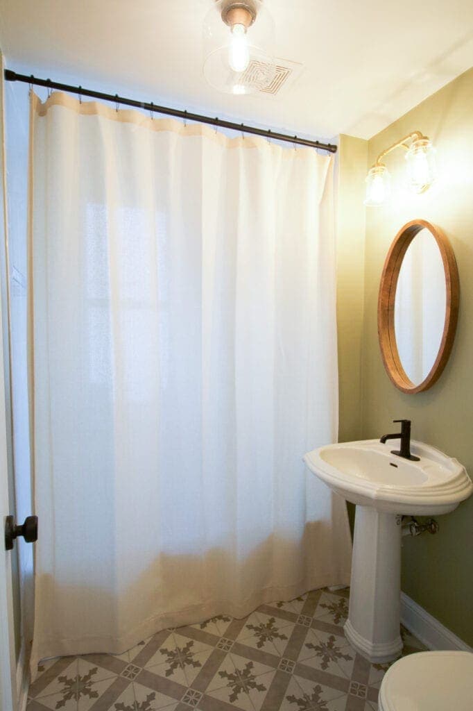 Extra long shower curtain in the bathroom