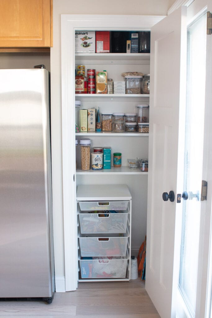 Our organized pantry with DIY closet shelves