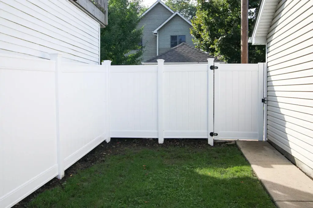 Our new white vinyl fence and gate
