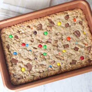 Loaded cookie bar recipe using leftover halloween candy