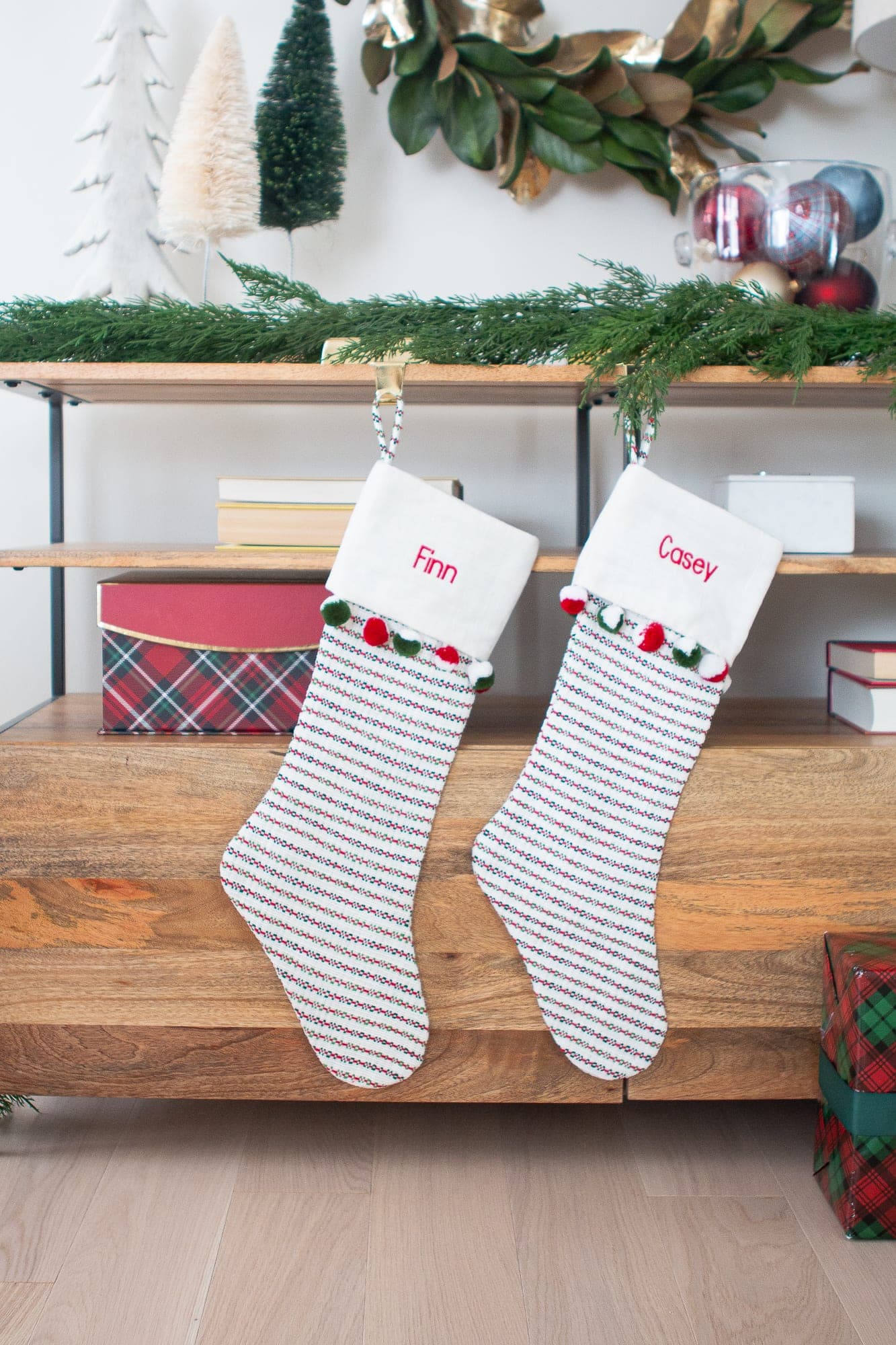 Use stockings in unexpected places in your holiday entry