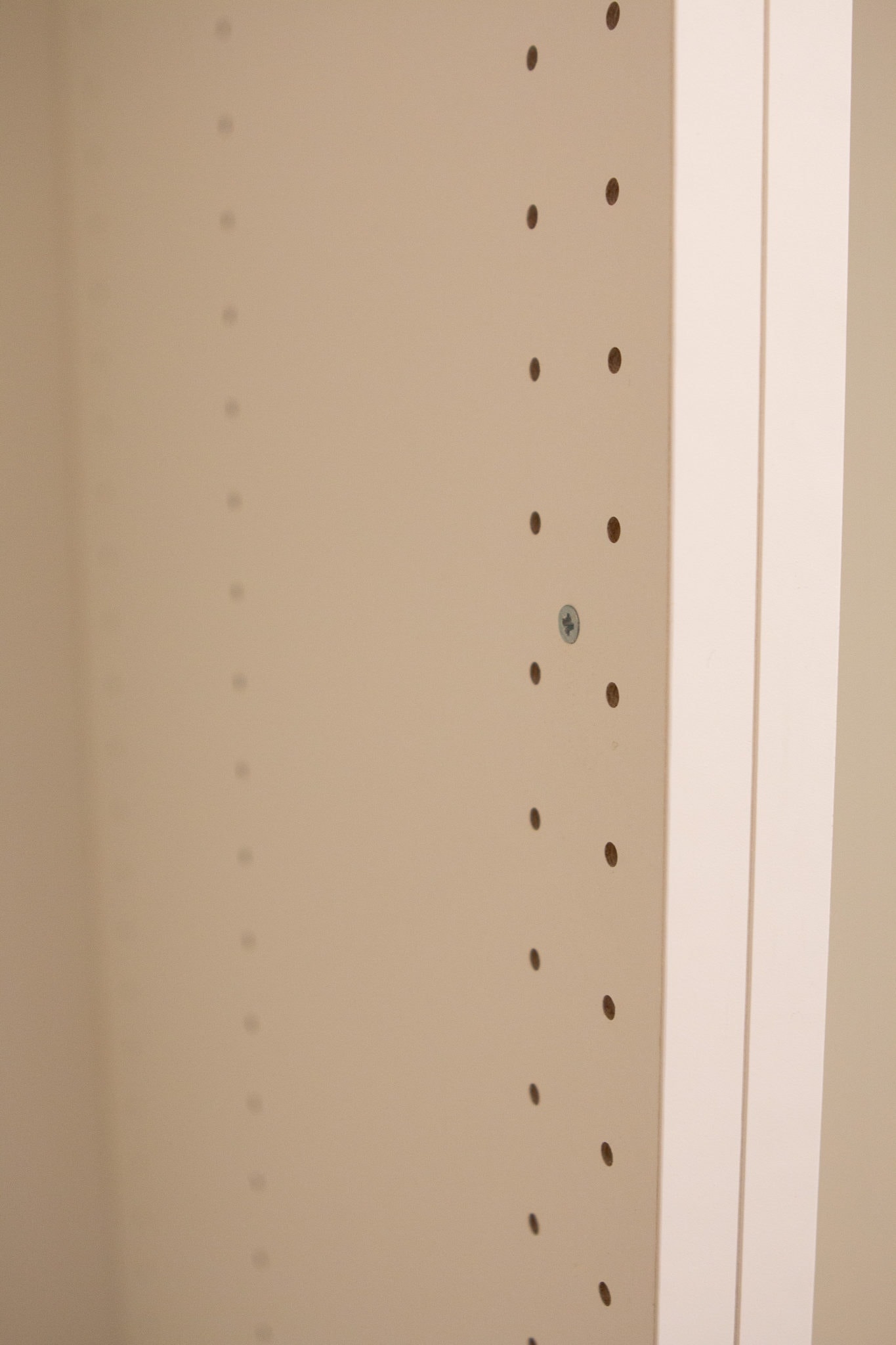 Use a screw to put cabinets together