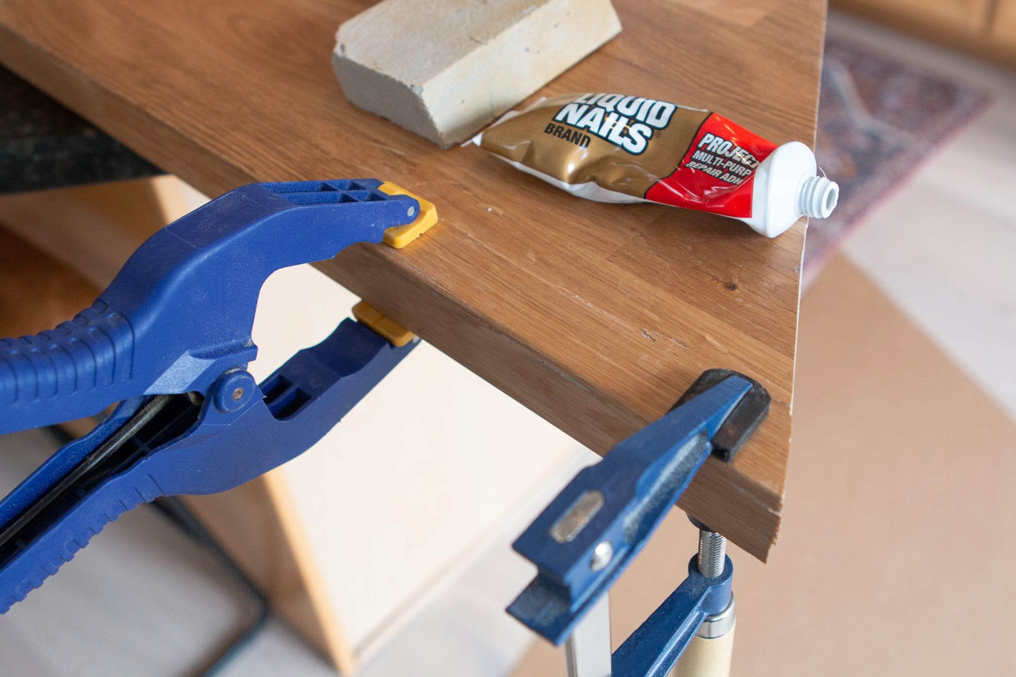Using liquid nails to fix a butcher block countertop