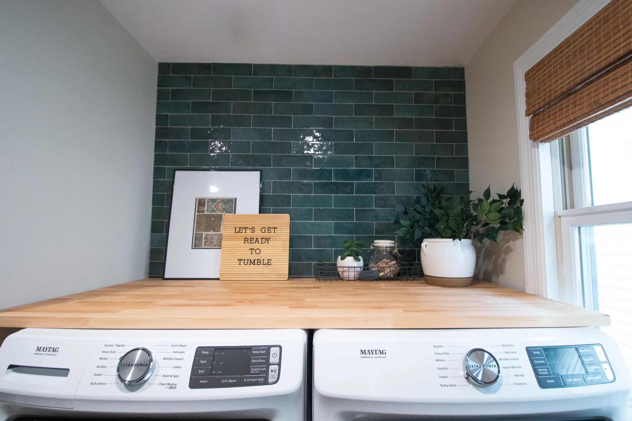 Adding green tile over a washer and dryer
