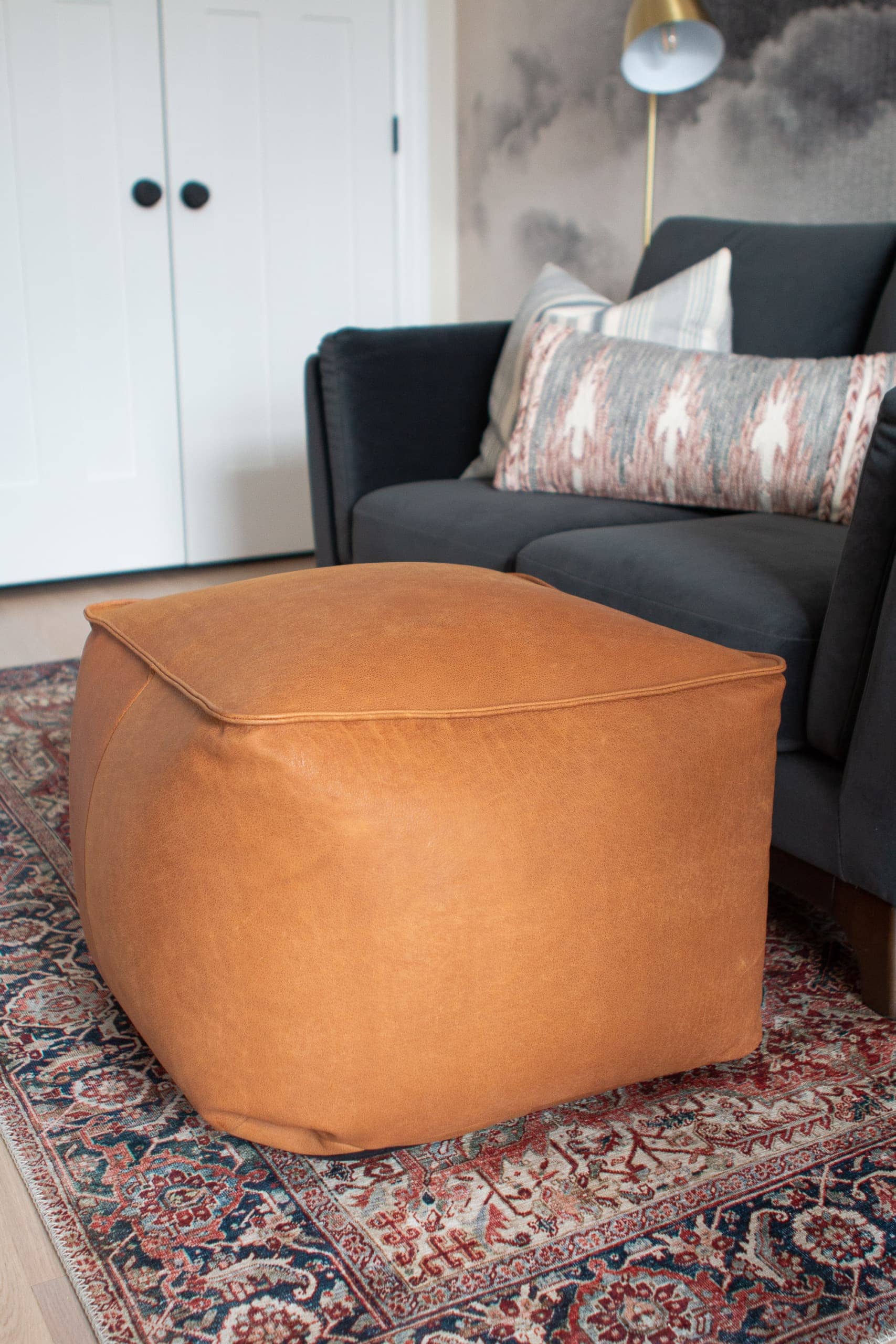 Leather pouf from article