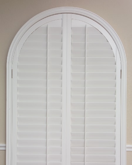 Plantation shutters for arched window