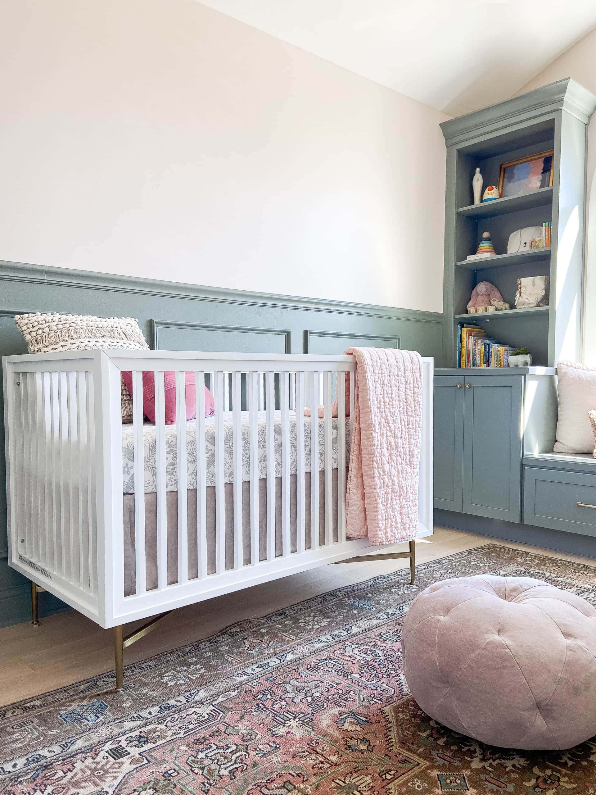 White and brass crib from Crate and kids