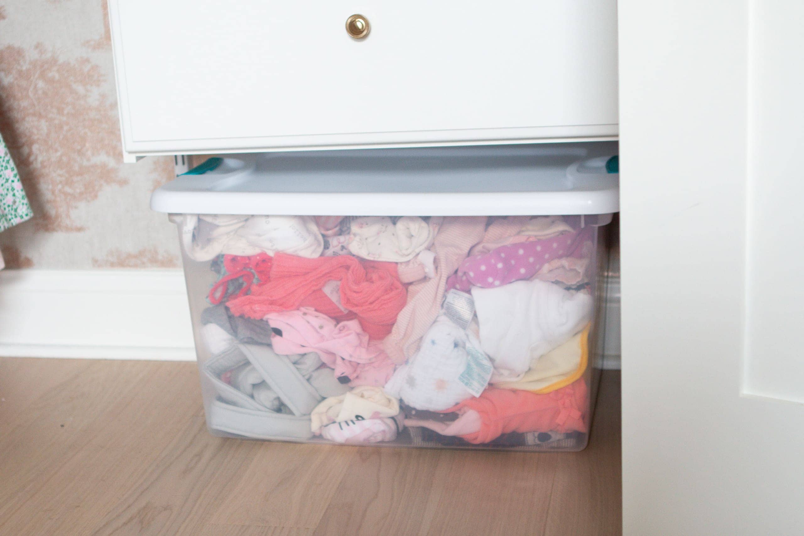Keep a clear bin in the closet to hold clothing that no longer fits