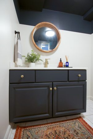 Basement Bathroom Updates – Painted Vanity, New Light Fixture, & More