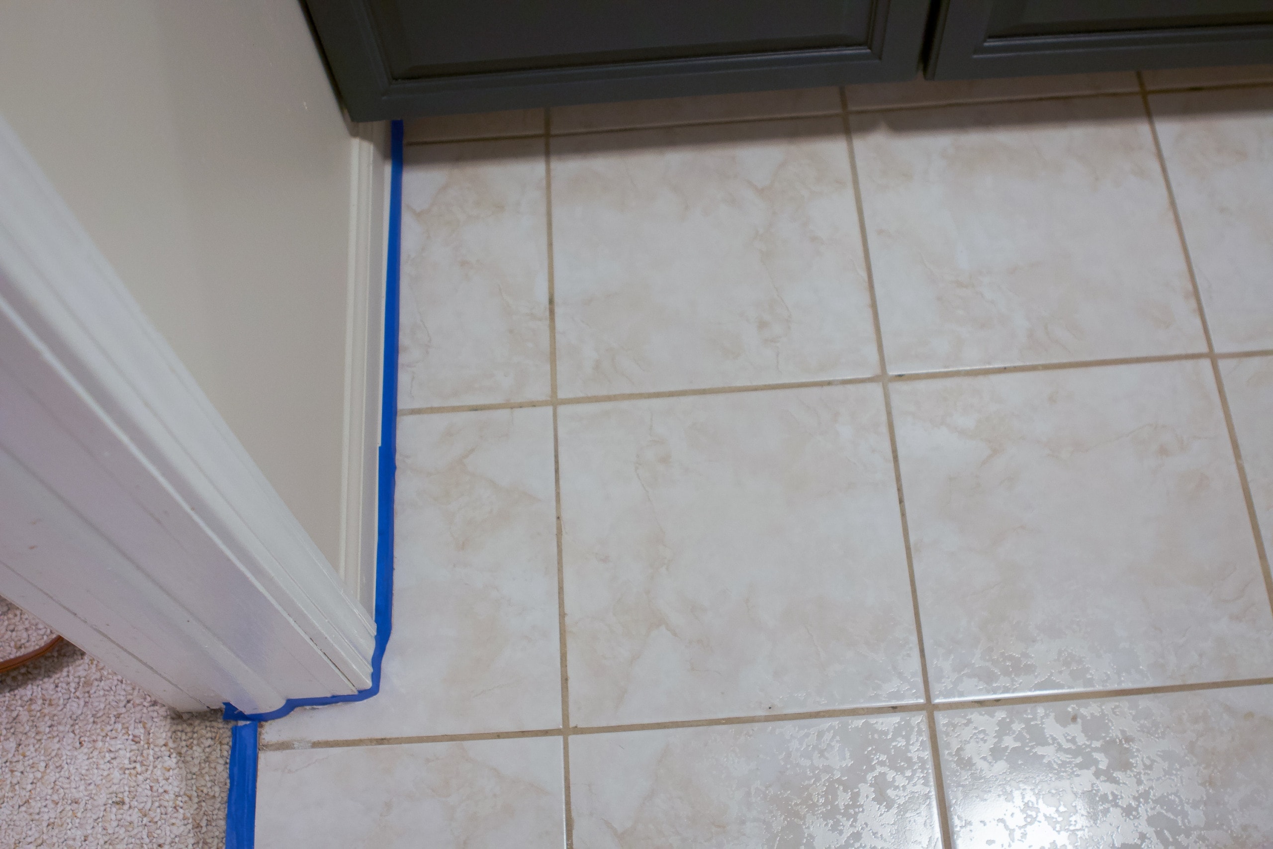 Once the floor is clean, you can tape off the baseboards
