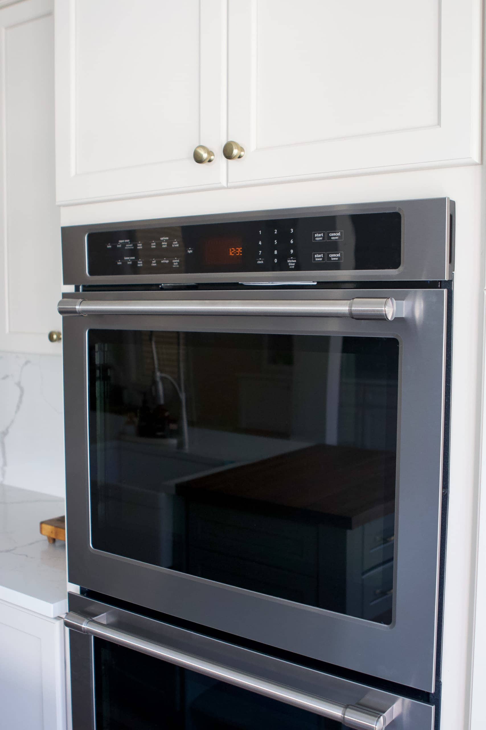 Choosing new kitchen appliances including a Maytag double oven