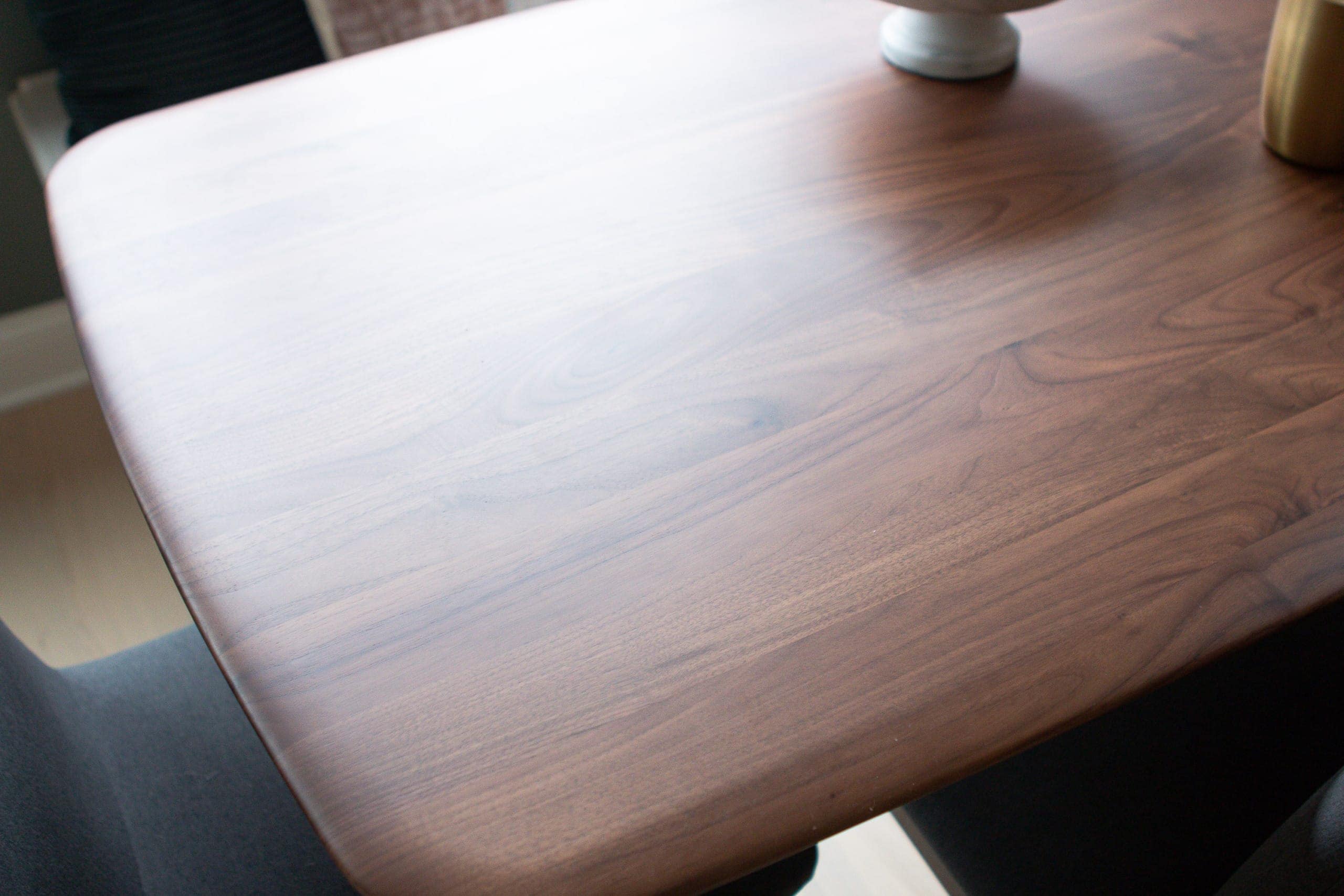 Curved edges on the Castlery wood dining table