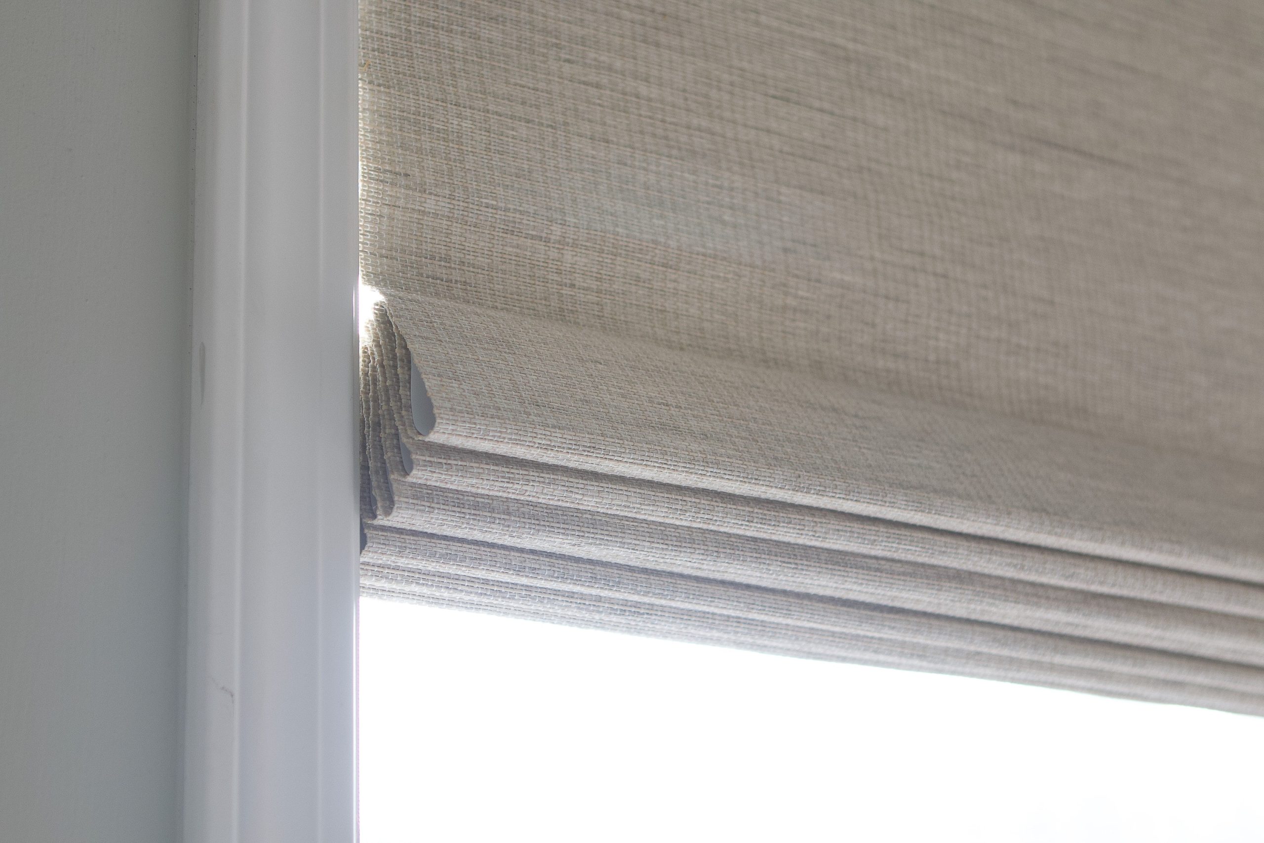 Choosing new window treatments with tips to install woven shades
