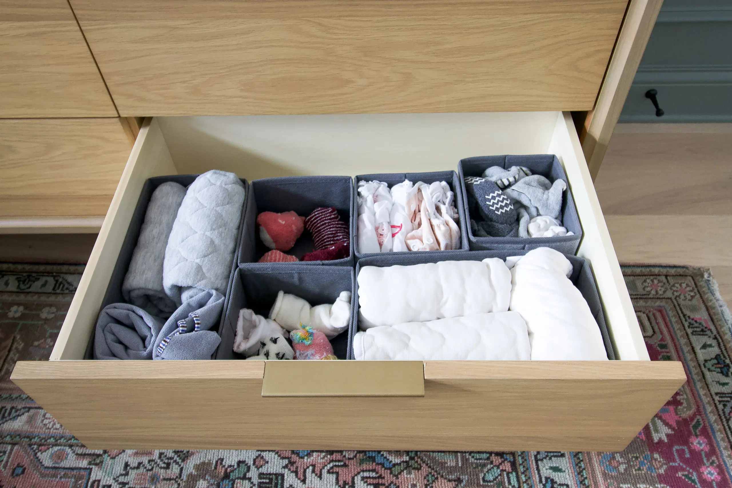 How to organize a nursery dresser