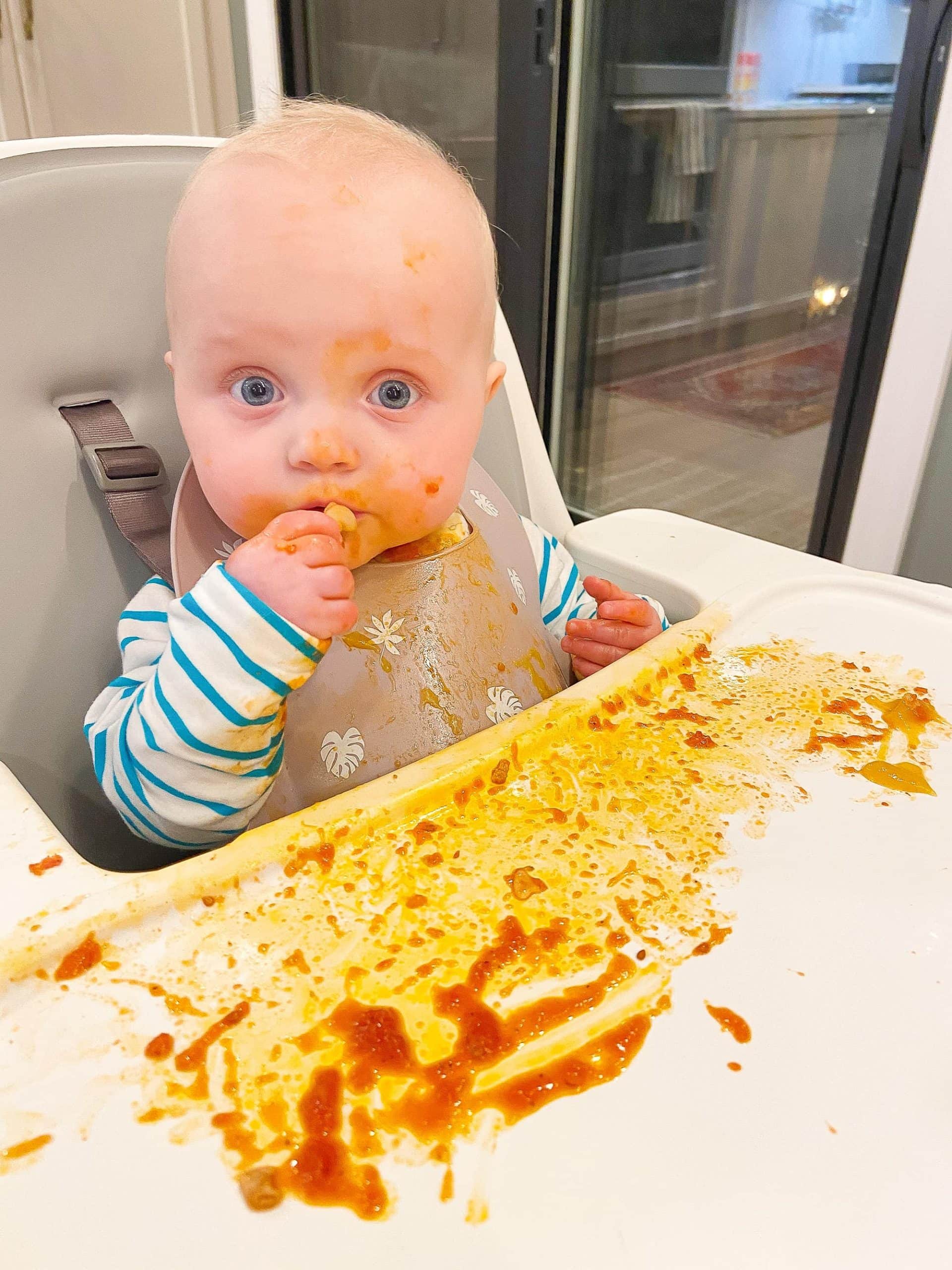 Eating pasta and meatballs from baby led weaning