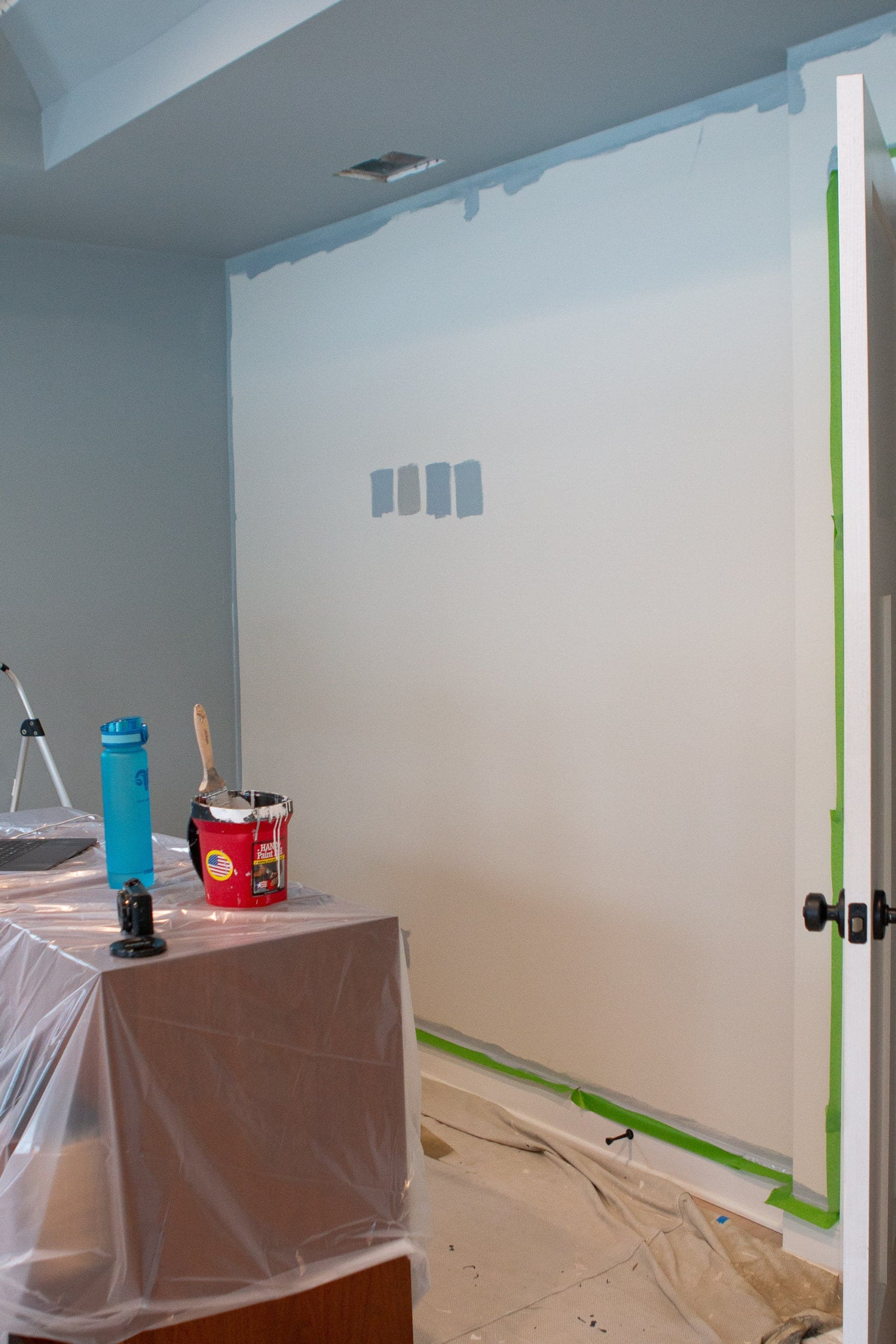 painting the walls in our bedroom a blue gray paint color - Benjamin Moore "Boothbay Gray"