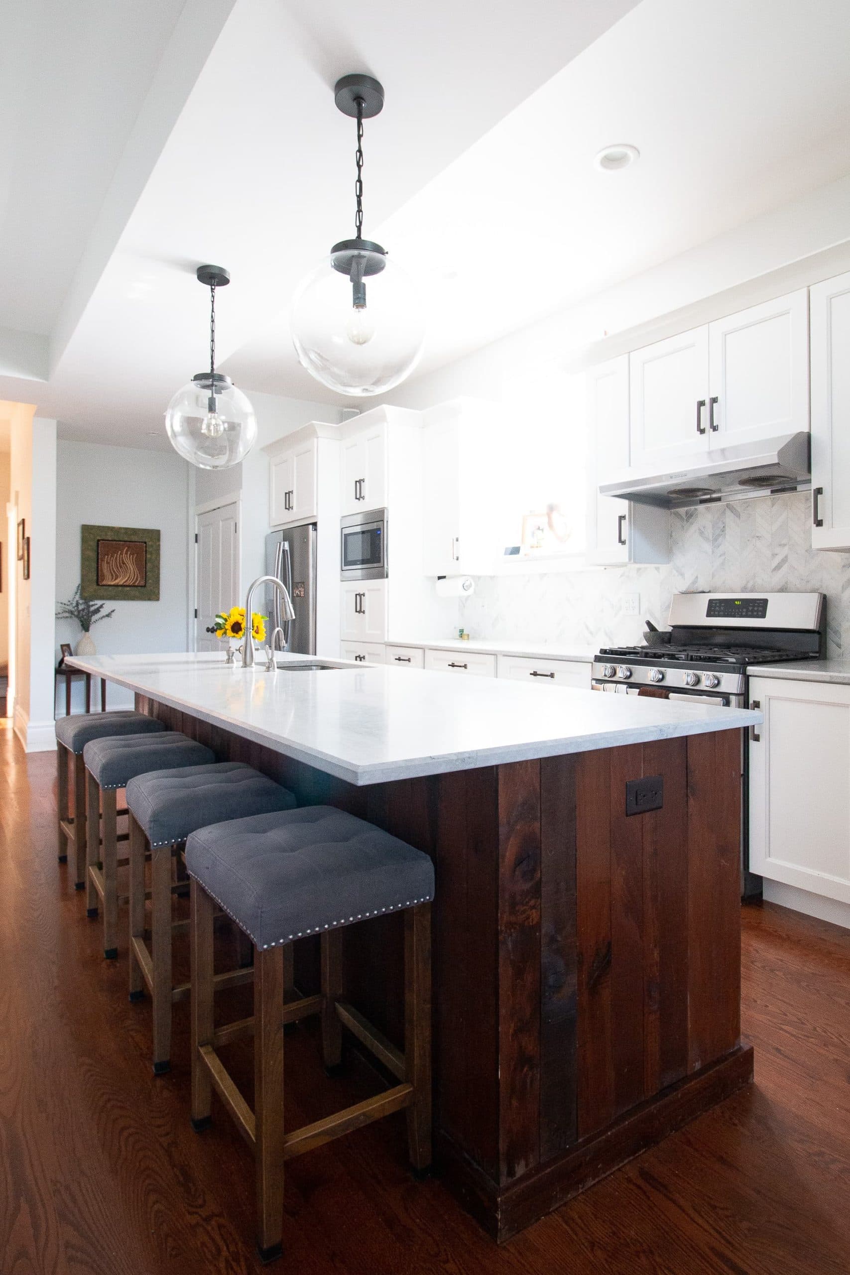 Large kitchen island with wood detailing