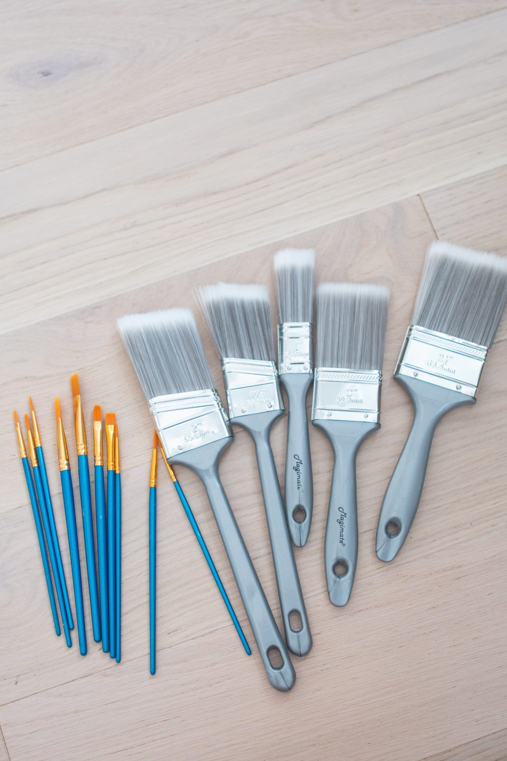 Craft supplies and brushes to create DIY abstract art