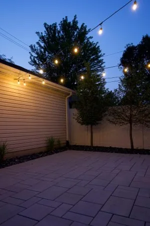 How to Install String Lights From Your House to Your Garage