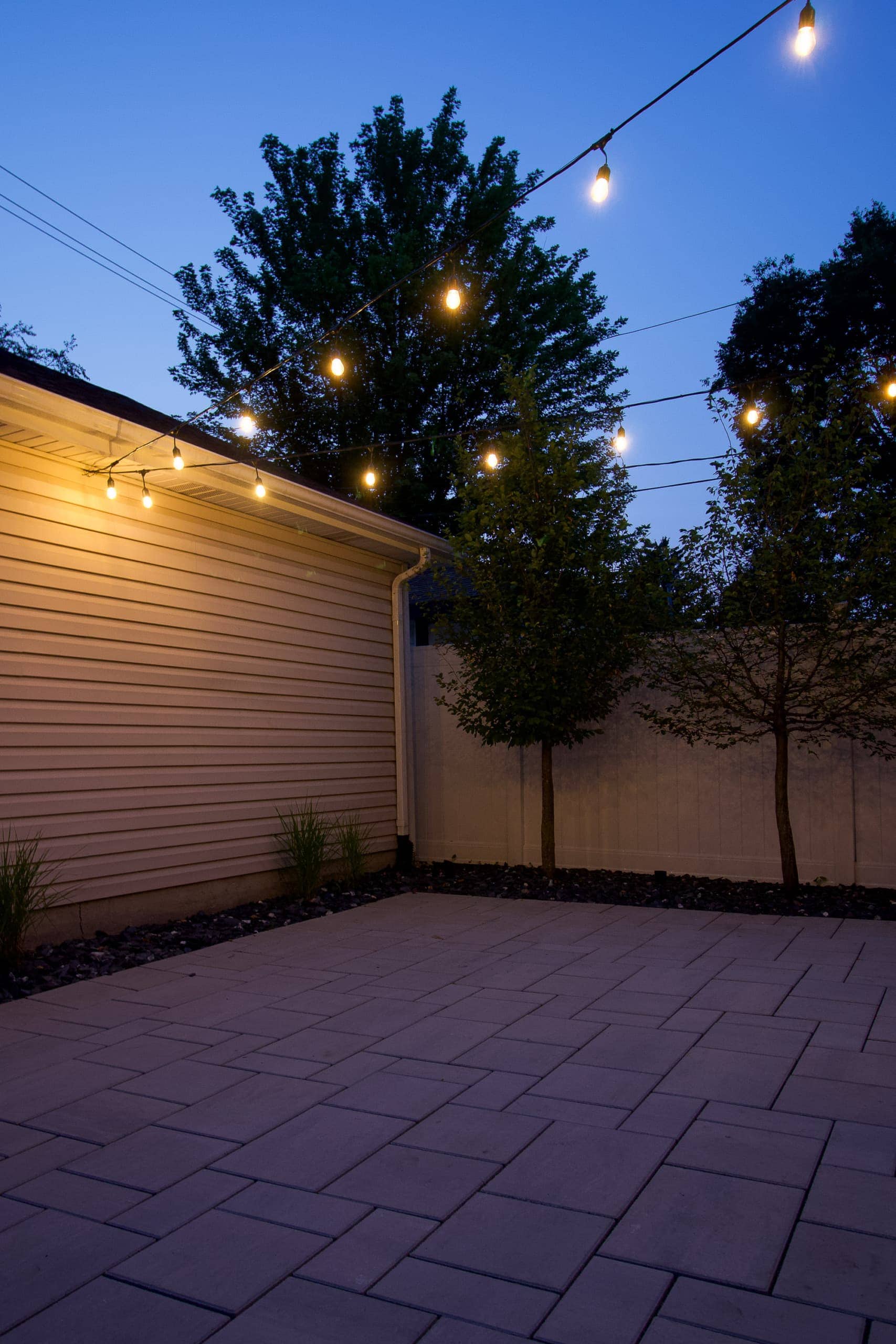 How to install string lights in your backyard