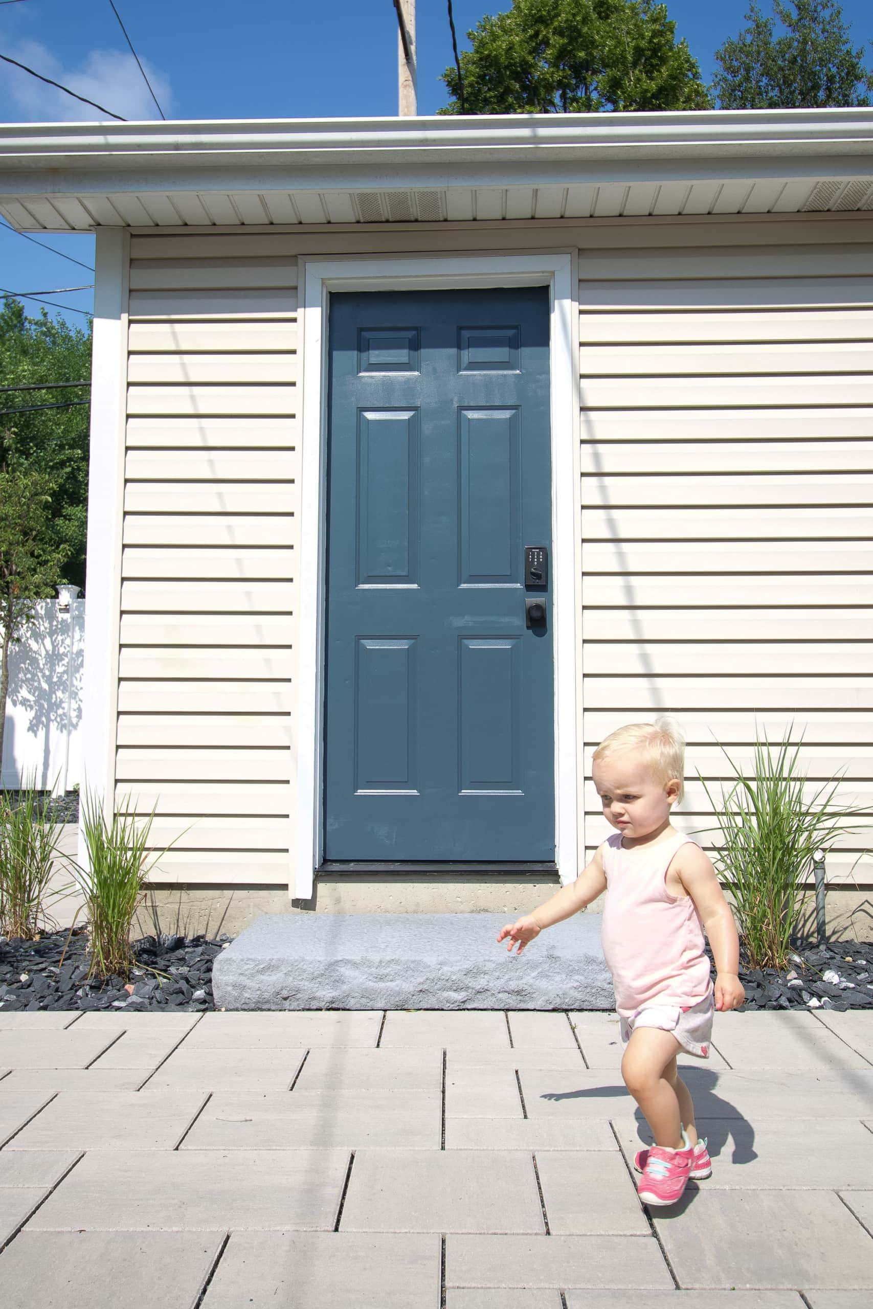 Our backyard DIY projects include painting the garage door