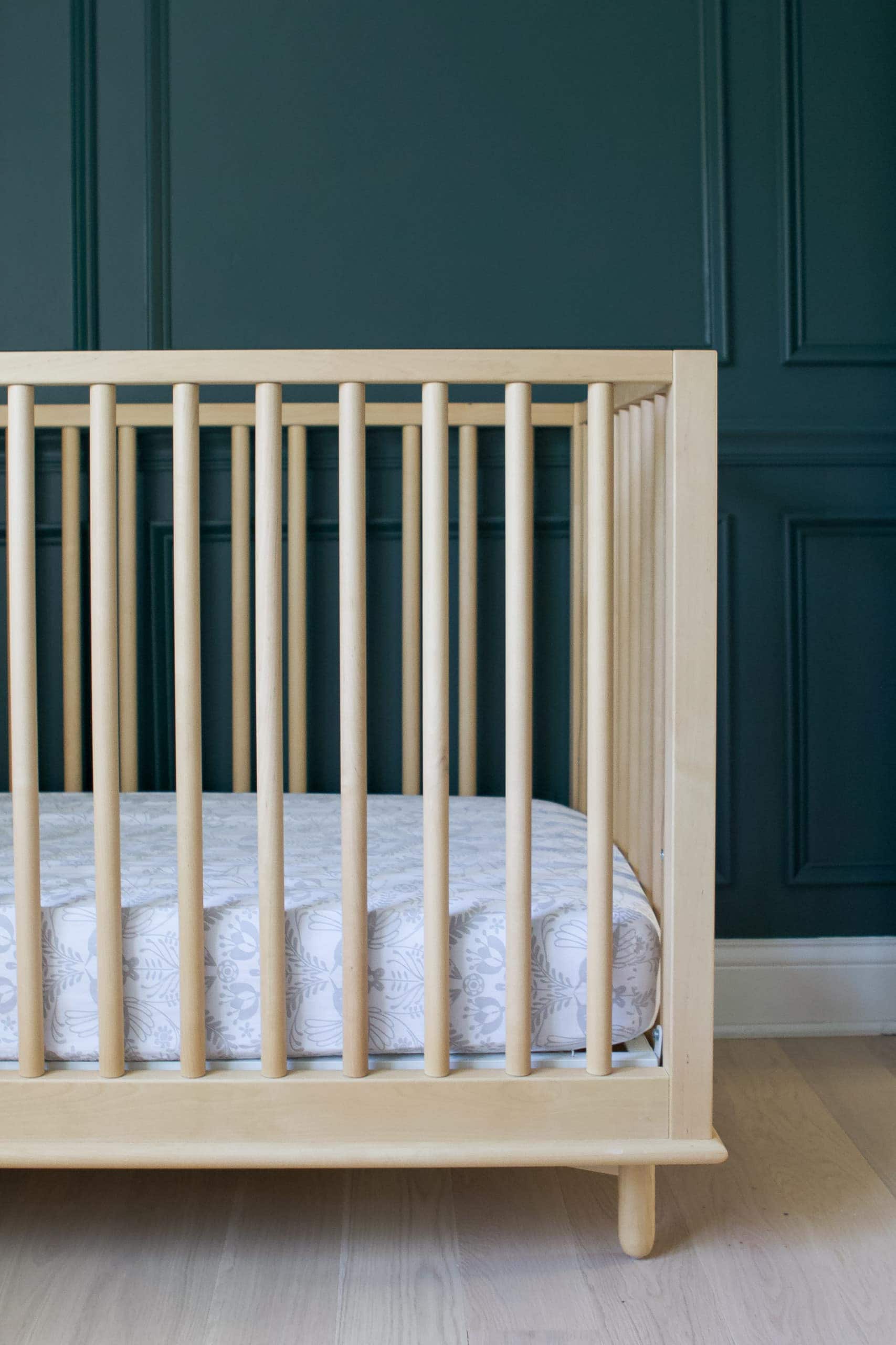 Our natural wood crib for the nursery