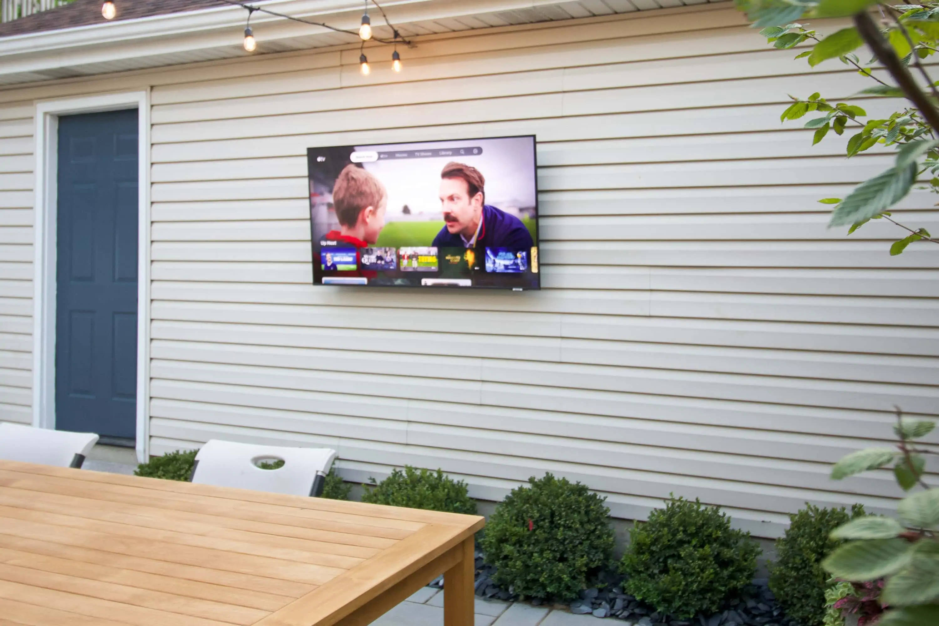 How do you protect an outdoor tv from weather?