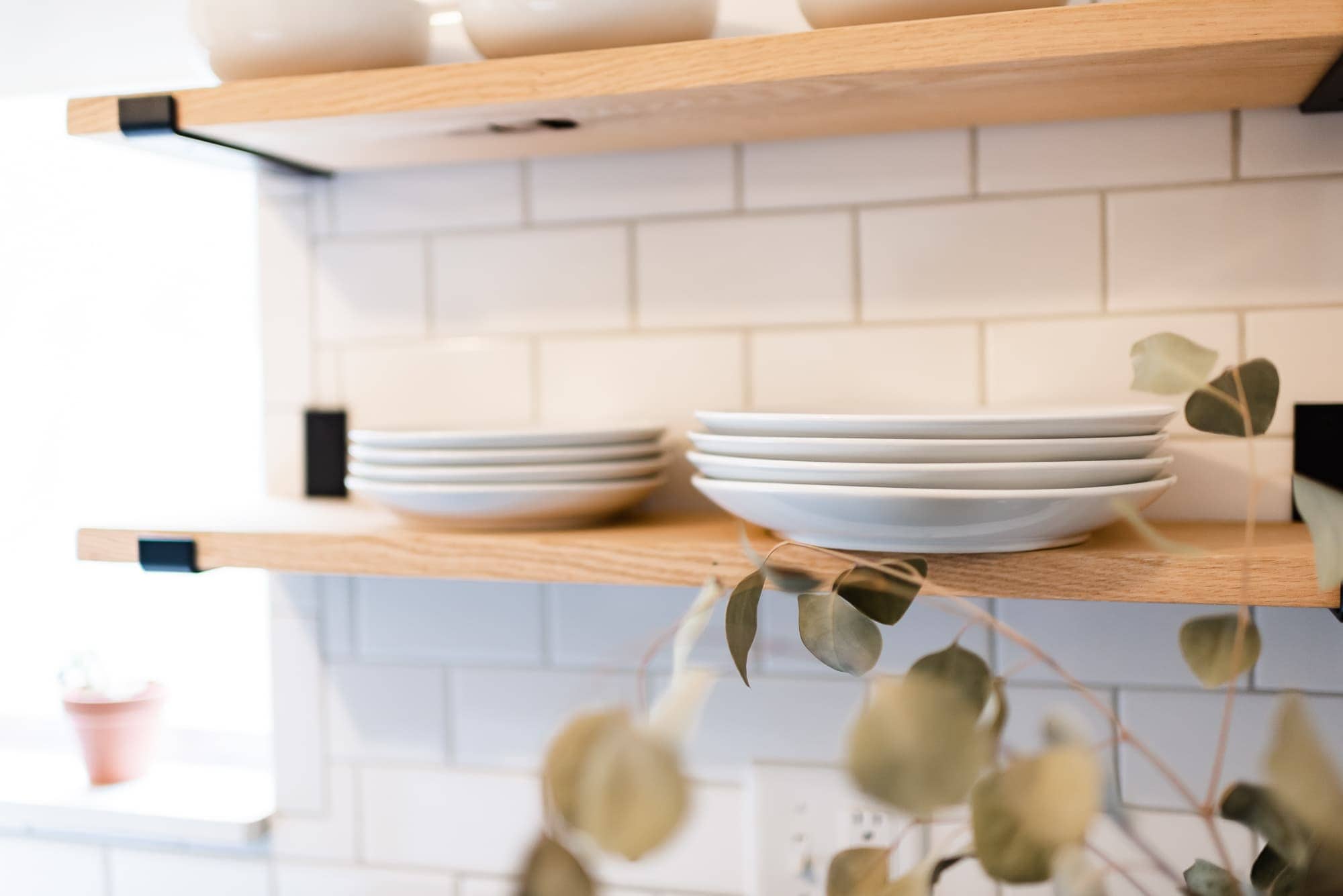 open wood shelves in a kitchen 