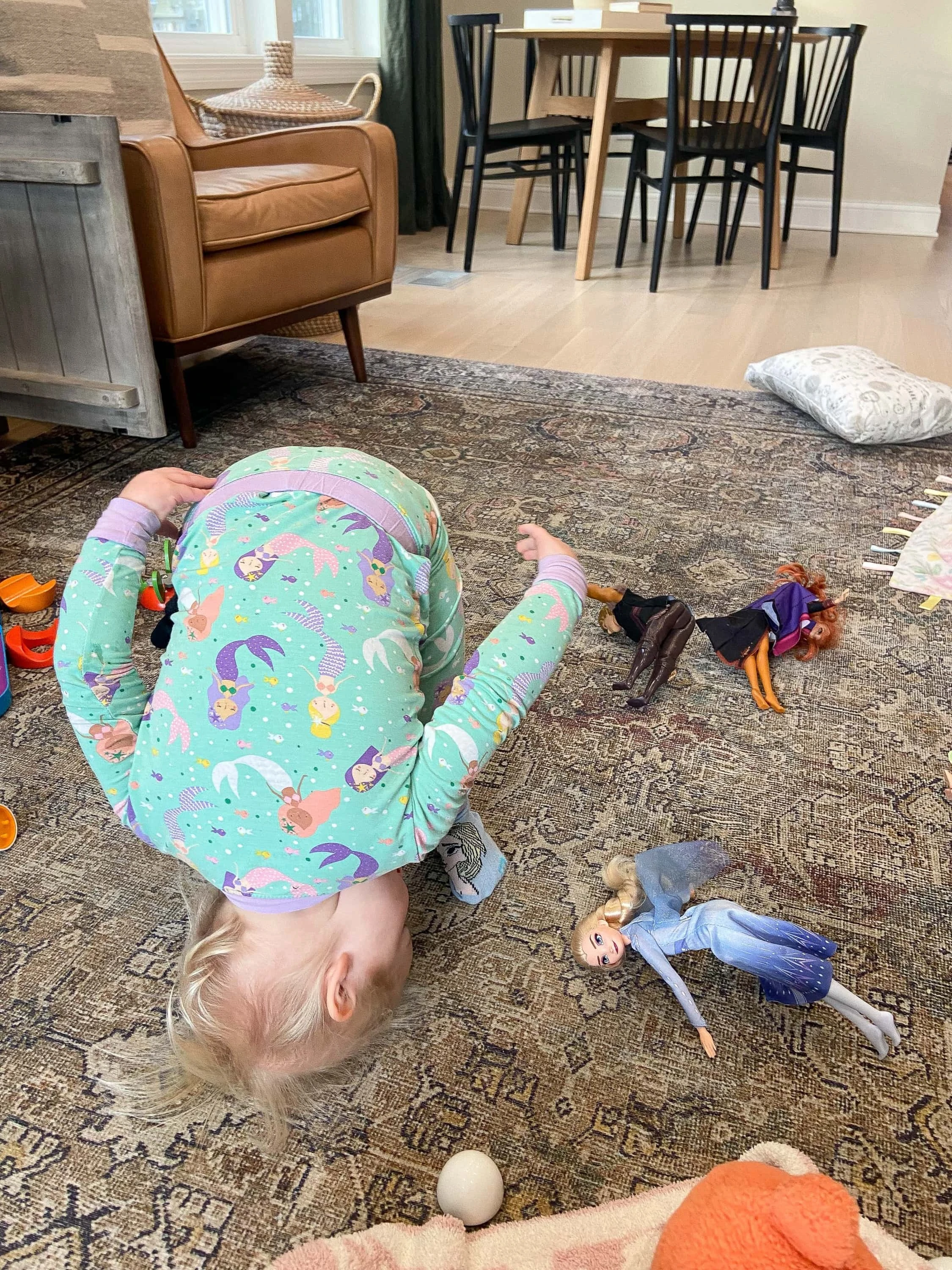 Rory doing yoga with her Frozen characters