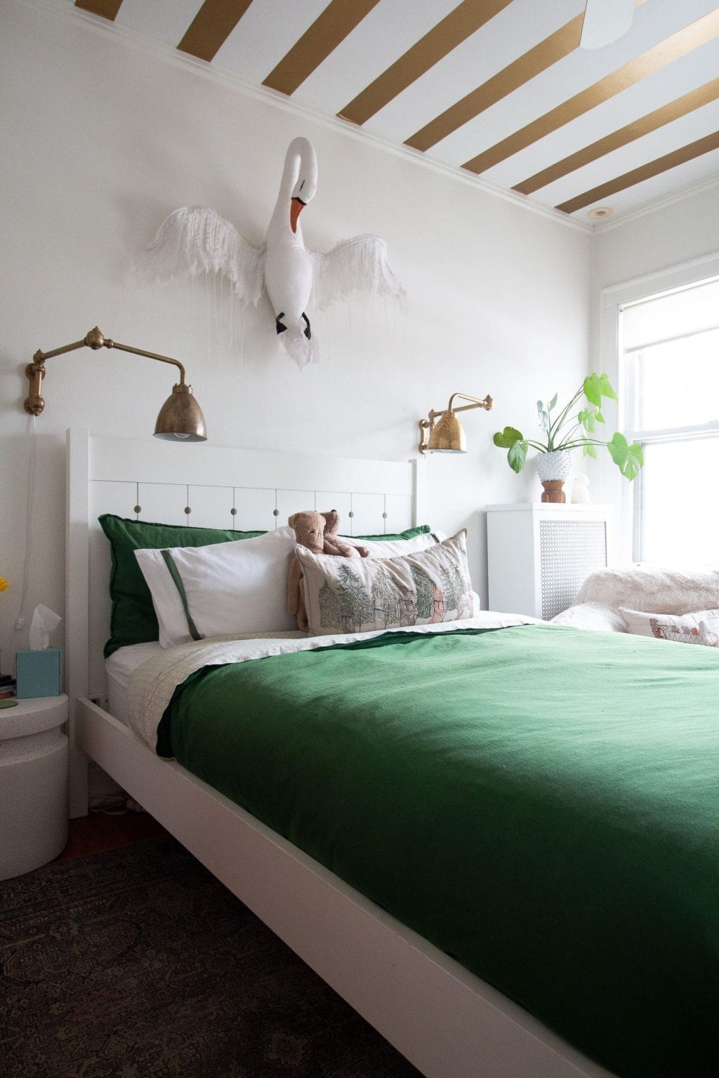 Teenage girl's room with green bedding