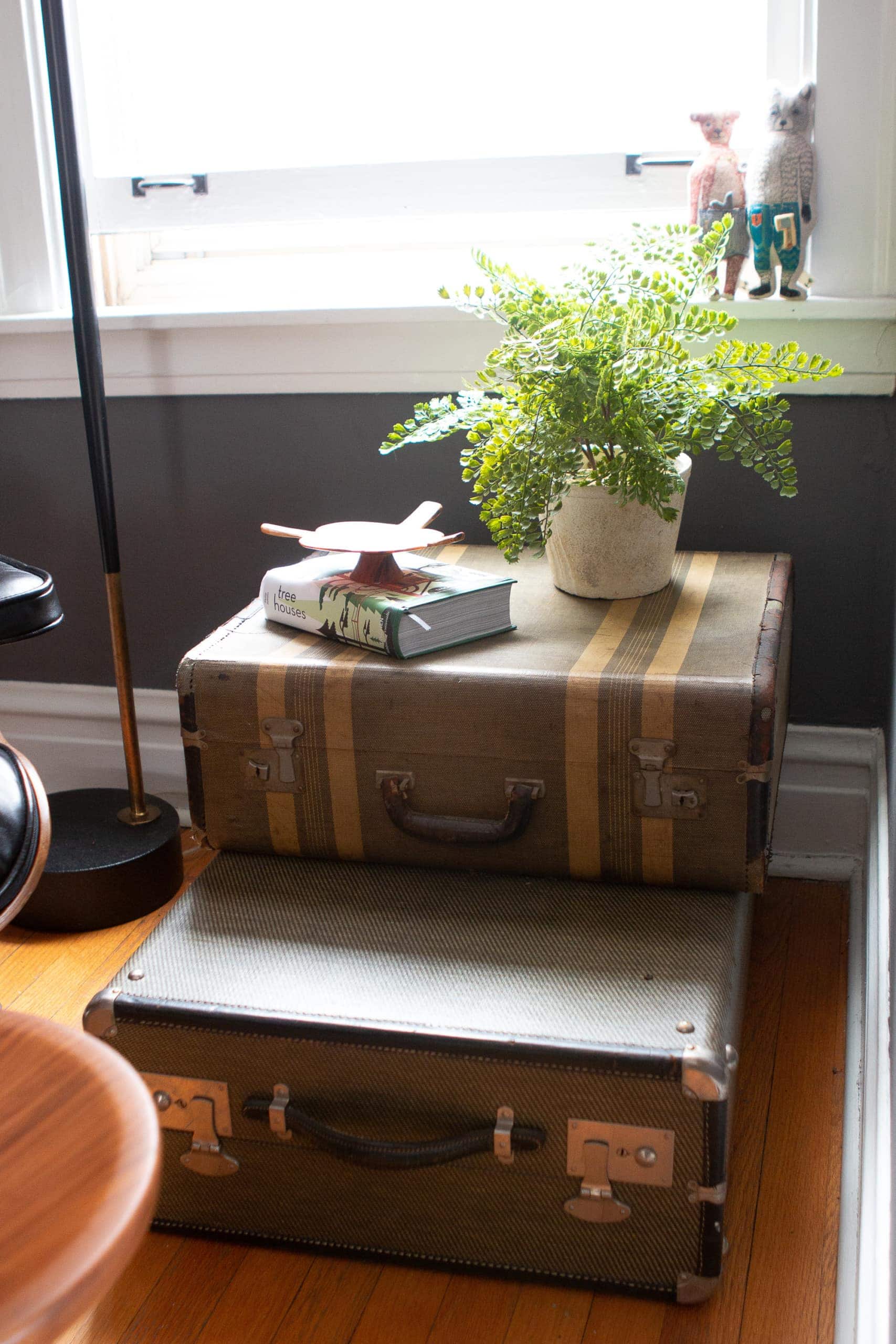 Adding a side table out of suitcases 