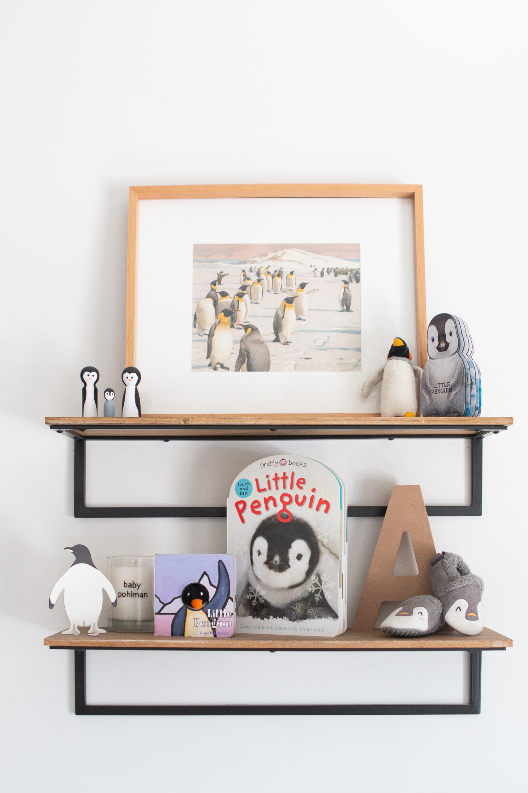 penguin shelf decor in a nursery